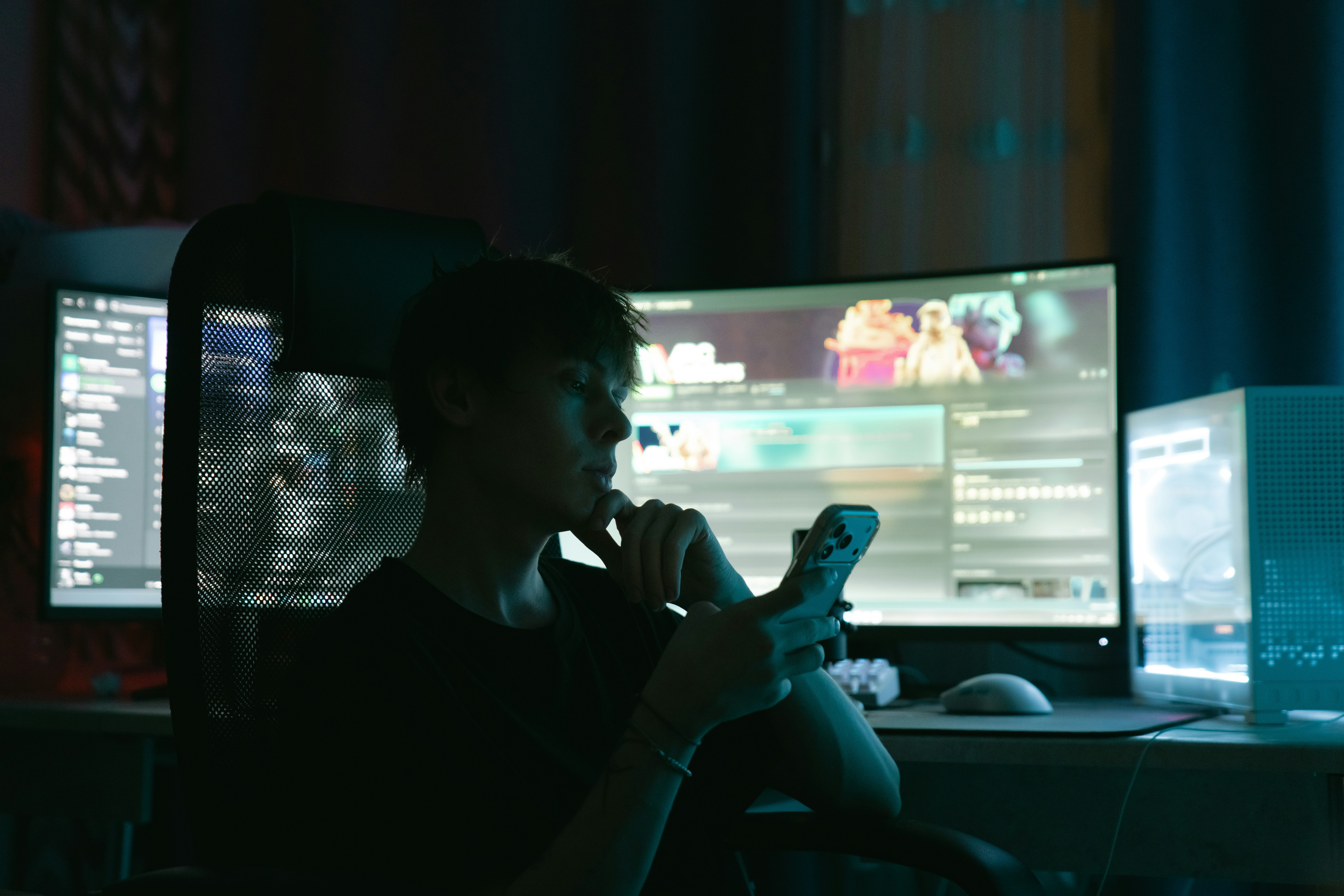 gaming setup monitor dark room